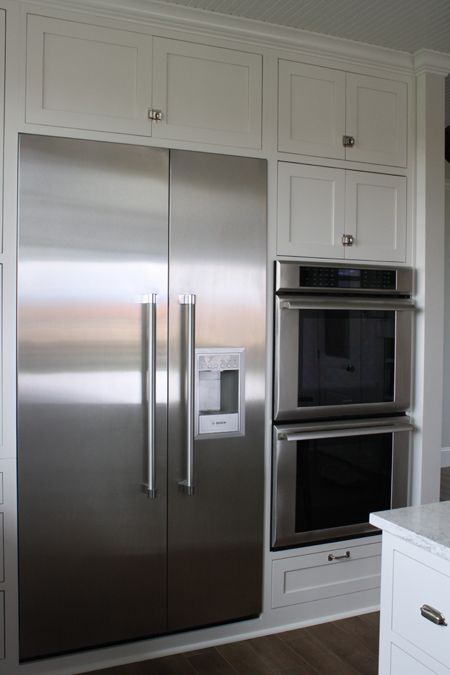 Column refrigerators and freezers are separate units that don't have to be installed together. You can have your freezer in one area, and fridge in another). Columns are really nice because they are installed flush with the cabinetry and don't have the vent on the top. They provide a really clean look. I want this fridg and double ovens in kitchen someday. Double Fridge And Freezer Cabinet Between, Double Fridge Freezer Kitchen, Fridge And Oven Side By Side, Nice Fridge, Fridge And Wall Oven Side By Side, Refrigerator And Double Oven Wall, Built In Refrigerator And Double Oven, Fridge And Freezer Side By Side, Fridge Side By Side