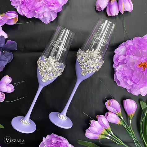 ❤️If you want to buy wedding glasses in a different color - https://www.etsy.com/shop/VIZZARA?ref=seller-platform-mcnav&section_id=18017626 ❤️Choose a set of wedding items in a different color - https://www.etsy.com/shop/VIZZARA?ref=simple-shop-header-name&listing_id=518552067&section_id=19090161 ️🤵🏼Elevate your Lavender-themed wedding toast with our exquisite set of 2 Champagne Glasses, personalized and adorned with sparkling rhinestones.  Crafted to perfection, these Lavender Wedding Champagne Glasses exude elegance and sophistication, making them the perfect addition to your special day. Each glass is delicately personalized with your names and wedding date, adding a personal touch to your celebration. The Lavender hue complements the romantic ambiance of your wedding, while the shimm Personalized Glasses Wedding, Lavender Wedding Theme, Wedding Champagne Glasses, Glasses Wedding, Personalised Glasses, Quinceanera Themes, Wedding Personalized, Lilac Wedding, Wedding Toasts