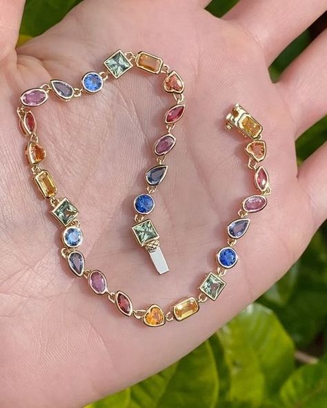 Julz on Instagram: "Ending this gloomy day with a magical 14k bezel set all rainbow sapphire tennis bracelet 🥹  It is 8” in length and can be shortened!! It has approx 5 carats of gorgeous fancy shape sapphires in all different rainbow colors 😍  Swipe to see this beauty on!!! More finds of our Vegas show coming tomorrow!! Don’t forget to turn on post notifications 🤩" Fashion Jewelry Necklaces Gold, Sapphire Tennis Bracelet, Vegas Shows, Rainbow Sapphires, Rainbow Jewelry, Gloomy Day, Pretty Jewelry, Sapphire Bracelet, Birthday Wishlist