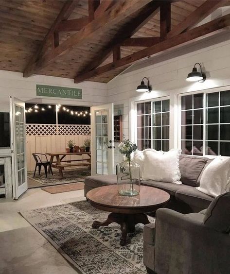 Farmhouse Is My Style on Instagram: "Relaxed farmhouse living... cozy livingroom with warm wood trusses, white shiplap, black gooseneck barn lighting, and concrete floors, then... french doors leading to a softly lit outdoor terrace. Dream home. (Photo Credit: @the_rusticpallet) 💞🏡🌳🌾🚜🐓💛🧡🌿🌼 •• Best Voted Farmhouse Bags!! ☕🧡👜 Year-End Bundle Sale! Up to 79% Off! Shop Now ➡️ ➡️ @farmhouseismystyle •• #farmhouse #modernfarmhouse #shiplap #archeddoors #hardwood #darkhardwood #slidingbarnd Lamps Design, Sunroom Addition, Farmhouse Living Room Decor Ideas, Room Lamps, Sunroom Decorating, Farmhouse Remodel, Hearth Room, White Shiplap, Farmhouse Living Room