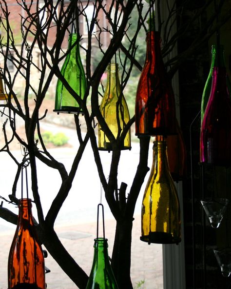 different bottle tree Bottles Hanging From Trees, Bottle Garden Art, Garden Porch Ideas, Wine Bottles Ideas, Garden Pond Ideas, Wine Bottle Trees, 18th Century England, Witch Balls, Glass Yard Art