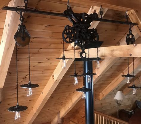 Hay Trolley light with two pulleys. Hay Trolley, Pulley Lamps, Entrance Lighting, Garage Renovation, Rustic Light Fixtures, Farm Projects, Rustic Pendant Lighting, Cabin Interiors, Rustic Kitchen Design