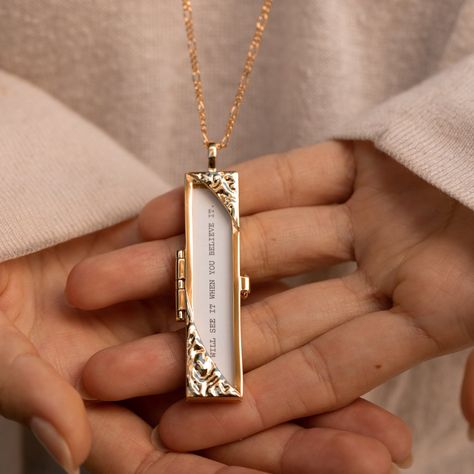 We're big fans of turning them and embracing new beginnings. If that's where you're at, let this locket symbolize good decisions unfolding. This locket opens to reveal a meaningful message you cherish. The glass window inside keeps your message safe from the everyday elements. Personalize or choose your fortune below, or we'll surprise you some of our most popular sayings. Dimensions: 2.65" x 0.5" (66 mm x 13mm)Chain length: 30" Meaningful Sayings, Locket Gold, Locket Design, Fairy Ring, Necklace Outfit, Glass Locket, Jewelry Lockets, Meaningful Jewelry, Gold Dipped