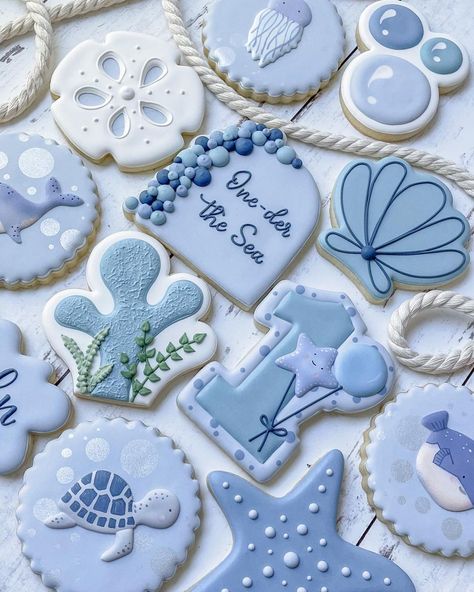 Krissy’s Cookies on Instagram: “One-der the Sea birthday cookies for a one-derful baby boy 🐳 Happy first birthday Lincoln! 🎂 (Sea creature inspo from birthday…” One Der The Sea Cookies, Under The Sea Cookies 1st Birthday, Sea Creature Themed Birthday Party, Oneder The Sea 1st Birthday Cookies, Oneder The Sea Cookies, One Der The Sea First Birthday Boy, Under The Sea First Birthday Boy, One Der The Sea First Birthday, Oneder The Sea 1st Birthday Boy