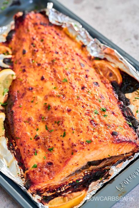 This honey mustard salmon recipe is super easy to make, incredibly tender, and moist. In just 20 minutes from start to finish, you can have a delicious and healthy dinner ready for your loved ones on a busy weeknight. Simply wrap the whole fillet in foil with the honey mustard sauce and bake to flaky perfection. Enjoy this quick and satisfying meal with your family! Healthy Holiday Baking, Honey Mustard Salmon Recipes, Honey Mustard Salmon, Salmon In Foil, Mustard Salmon, Healthy Holiday Recipes, Best Seafood Recipes, Spicy Salmon, Quick Weeknight Meals