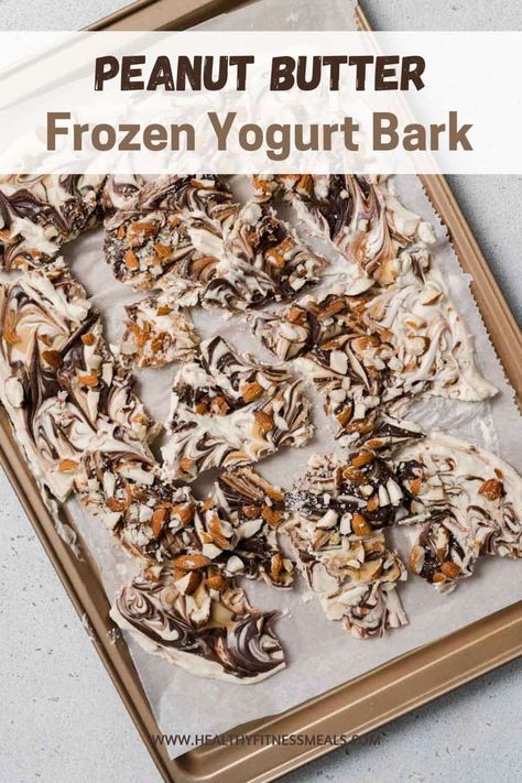 Frozen yogurt bark with peanut butter, chocolate chips, and added protein is SO easy to make and melt-in-your-mouth delicious! Frozen Yogurt Bark Peanut Butter, Peanut Butter Yogurt Bark, Protein Yogurt Bark, Protein Bark, Protein Biscuits, Peanut Butter Bark, Frozen Peanut Butter, Yogurt Bark Recipe, Peanut Butter Yogurt