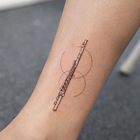 Flute Tattoos For Women, Bass Clarinet Tattoo, Flute Tattoo Designs For Women, Flute Tatoos, Flute Tattoo Design, Clarinet Tattoo, Word Tattoo Designs, Flute Tattoo, Small Music Tattoos