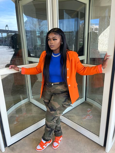 Camo Pants Outfit Black Women Sneakers, Camouflage And Orange Outfit, Camo Pants With Blazer Outfit, Dunks And Blazer Outfit, Orange Blazer Outfits Fall, Blue And Orange Outfit Black Women, Orange And White Dunks Outfits, Camo And Orange Outfit, Orange And Camo Outfit