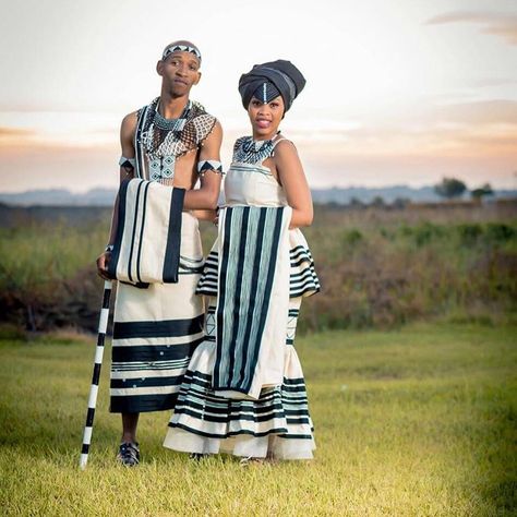 MOST FASHIONABLE XHOSA FOR COUPLES FOR WEDDING Xhosa Couple Traditional Attire, Xhosa Traditional Attire For Couples, Umbhaco Xhosa Designs Black And White, Xhosa Traditional Wedding, South African Dresses, Xhosa Bride, Xhosa Traditional Dresses, Black And White Xhosa Traditional Dress, Xhosa Wedding