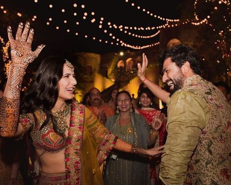 #Exclusive - Haldi & Mehendi ceremonies pictures of Newly wed B-Town couple Katrina Kaif & Vicky Kaushal. from Sabyasachi wedding outfits to beautiful couple portraits, these wedding photos are must seen. #shaadisaga #indianwedding #celebritywedding #bollywoodwedding #indiancelebrityweding #sabyasachilehenga #redsabyasachilehenga #bridalsabyasachilehenga #katrinakaifandvickykaushalwedding #katrinakaifandvickykaushalweddingpictures #katrinakaifandvickykaushalmarriage #katrinakaiflehenga शादी की तस्वीरें, Mehndi Outfit, Vicky Kaushal, Mehndi Ceremony, Best Mehndi, Haldi Ceremony, Bollywood Wedding, Couple Dancing, 2022 Fashion