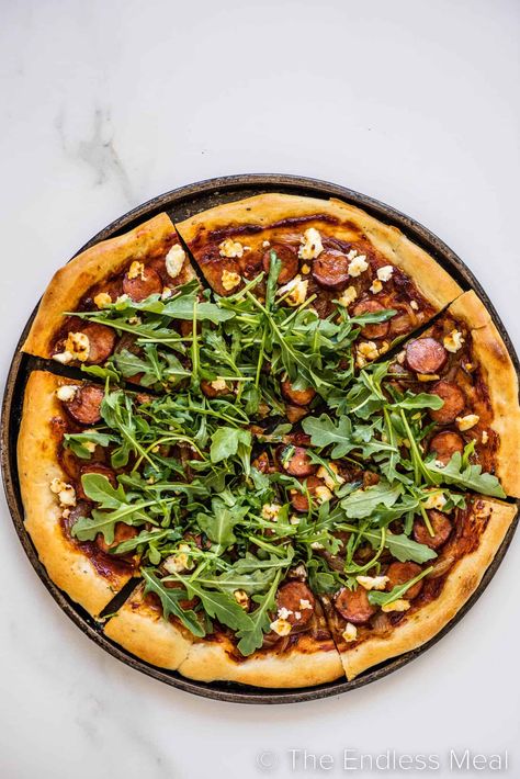 We've come to learn that some foods, like this chorizo pizza, really can make life better. Caramelized onions, chorizo, and goat cheese are a delicious threesome of ingredients that can't be beat. It's an easy pizza recipe for weeknights, and it's ready in just 30 minutes! #theendlessmeal #pizza #chorizo #chorizopizza #pizzarecipe #dinner How To Make Chorizo, Pizza Chorizo, Chorizo Pizza, Types Of Pizza, Make Life Better, Pizza Sauce Homemade, Pizza Recipes Easy, Chorizo Sausage, Pizza Flavors