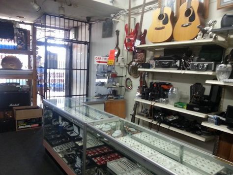 Interior of Crown Pawn Shop, Roscoe Boulevard, Canoga Park, Los Angeles. Recognise it, film fans? Credit Rab Fallon for the photos. Film Art Department, Pawn Shop, Pawn Shop Aesthetic, Wardrobe Department Film, Film Studios Architecture, 90s Department Store, Canoga Park, Fantasy Homes, Car Games