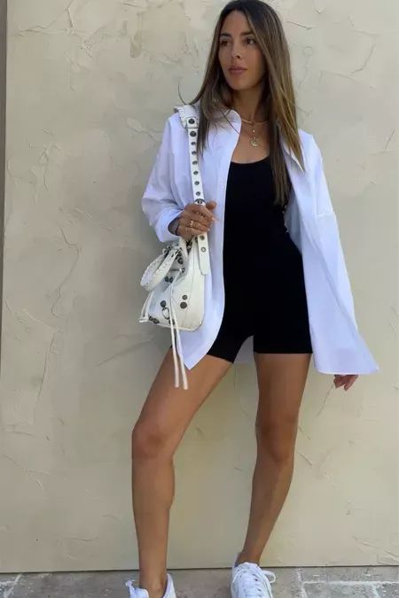 Bodysuit With Oversized Shirt, Romper And Shirt Outfit, Black Romper With Tights, Bike Shorts Romper Outfit, Bike Shorts White Button Down, Biker Shorts And White Button Up, Romper And Jacket Outfit, Romper With Button Down Shirt, White Button Down Casual Outfit