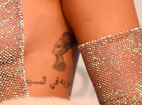 Rihanna Nefertiti Tattoo, Nubian Tattoo, Selene Tattoo, Y2k Tats, Queen Nefertiti Tattoo, Bad Gal Riri, Nefertiti Tattoo, Rihanna Tattoo, Egyptian Queen Nefertiti