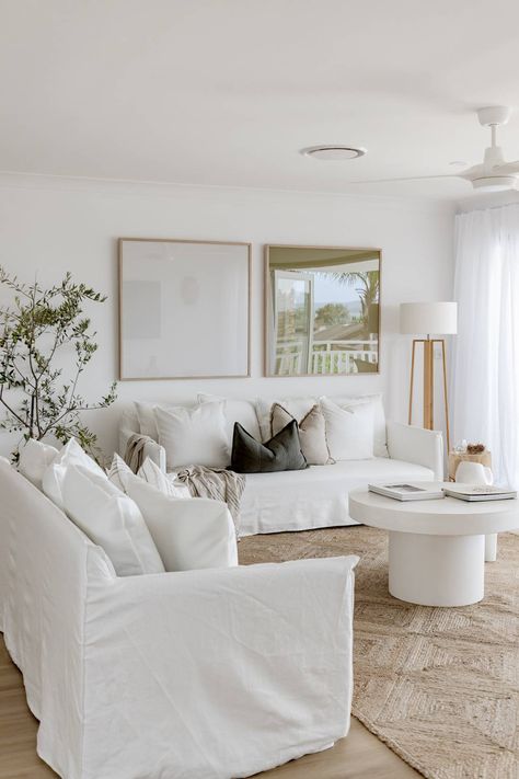 These Living Rooms Will Inspire You to Take the Plunge on a Winter White Sofa White Couch Interior Design, Coastal White Living Room, Lounge Room Art, Large Lamps Living Room, Large Lounge Room Ideas, White Table Lamp Living Room, Open Wall Decor Living Room, White Couches Living Room Decor, White Coastal Living Room