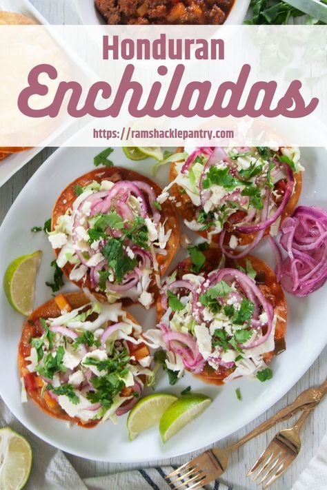 Honduran Enchiladas are a delicious and tasty twist on the classic enchilada. This Honduran Enchilada recipe has plenty of flavors and is easy to make. If you want to try something new and be a little surprised, this recipe is for you. Honduran Enchiladas, Honduran Recipes, Hispanic Dishes, Pantry Recipes, Quick Pickled Onions, Enchilada Recipe, Enchiladas Recipe, Eat Beef, Juicy Steak