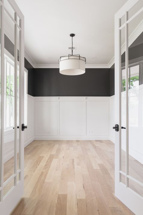 White wainscot with a constrasting black wall and light floors. This is the kind of balance we love to see! Dining Room White Wainscoting, Dining Room White, Black Wainscoting, Wainscoting Bedroom, White Wainscoting, Timeless Interiors, Room White, Bedroom Renovation, Condo Living