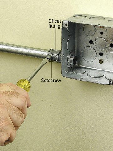 How to Install Metal Conduit | Better Homes & Gardens Electrical Conduit Ideas, Conduit Lighting, Electric Installation, Conduit Bending, Rustic Wall Lighting, Home Electrical Wiring, Electrical Conduit, House Wiring, Lounge Lighting