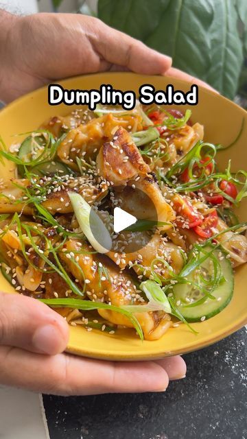 Saransh Goila on Instagram: "Trust me doston, this is the ULTIMATE way to eat dumplings in my opinion! Who would’ve thought that momo could be added in a salad right 🤯🙂‍↔️. Dumpling salad has been trending on the Internet for weeks & I knew I had to try it using momos! This dumpling salad recipe is inspired by @hettymckinnon and @sebscrispyclub I’d love for them to try the Indian momos version! Would you try this at home? Let me know in the comments!  . .  Dumpling Salad   2 tbsp Light soy sauce  1 tbsp Peanut butter  2 tsp Chili oil  Juice of 1/2 a lemon  2 Garlic cloves, grated  A few coriander leaves  Mix well   1 tbsp Oil  Place 10 momos  1/4 cup Water  Cover & cook till all the water has evaporated  & the momos are crispy   Add them to a bowl  Chopped cherry tomatoes  A handful of s Dumpling Salad Plant You, Dumpling Salad Recipe, Indian Momos, Dumpling Salad, Pork Dumpling, Vegetarian Salads, Spring Onions, Chili Oil, Coriander Leaves