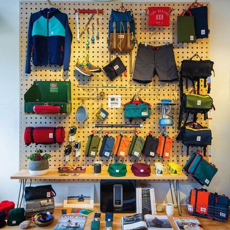 Kayak Storage Garage, Diy Peg Board, Camping Gear Storage, Gear Room, Showroom Inspiration, Gear Storage, Retail Space Design, Basement Inspiration, Topo Designs