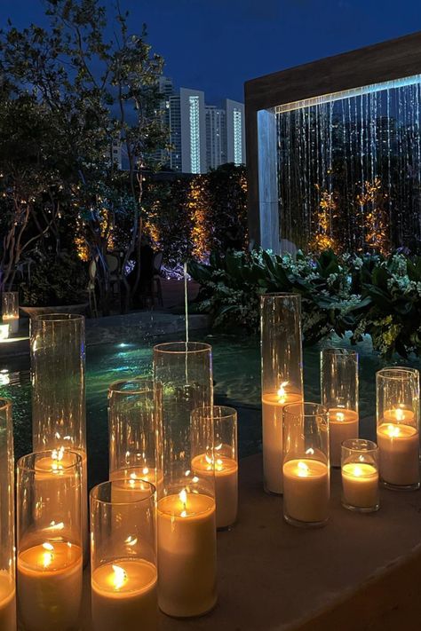 The Scared Place Miami | Andres + Indira | Lennox & Grace Candle Co. | Stunning candlelight along the pond in Miami. Discover event styling party decor, event styling stage, and event styling aesthetic. Make an inquiry with Andrea, the owner of Lennox & Grace Candles Co., at www.lennoxandgracecandles.com Diwali Party Aesthetic, Pool Candles Wedding, Balcony Candles, Candles In Pool Wedding, Night Candle Wedding, Candlelight Aesthetic, Candle Lit Cocktail Party, Floor Candles, Candle Lit Wedding Dinner