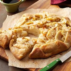 Almond Pear Tart Recipe -I had never seen a "pie without a pan" until my daughter brought back this wonderful recipe from a Rotary Club exchange program in Belgium. It's still a family favorite after all these years. —Sherry LaMay, Capitan, New Mexico Fresh Pear Recipes, Pear Tart Recipe, Pear And Almond Tart, Almond Tart Recipe, Pear Almond, French Dessert Recipes, Almond Tart, Pear Tart, Galette Recipe