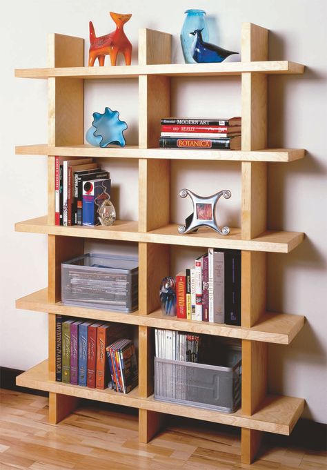 Contemporary Bookcase Fresh, clean lines, simple, strong construction, and a design you can modify to fit any room. By Randy Johnson The credo of many great 20th century architects was “Form Follows Function.” And for this bookcase, it certainly does. The strong shelves are supported in a straightforward fashion by equally strong uprights. No decoration, no superfluous details, not even a back to mar its perfect geometry. For you, the woodworker, this bookcase … Diy Bookshelf Design, Diy Bookshelf Plans, Buku Diy, Bookcase Plans, Unique Bookshelves, Simple Bookshelf, Bookshelf Plans, Contemporary Bookcase, Bookcase Diy