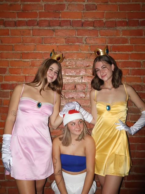 Princess peach, mario, princess daisy, toad, mario bros, mario kart, pink dress, silk gloves, crown, yellow dress, girls, friends, college, costume, fun, cute, outfit inspo, matching, toad, trio, yay Daisy Mario Cart Halloween Costume, Princess Peach Daisy And Rosalina Halloween Costume, Mario And Daisy Costume, Mario Horse Costume, Mario Dress Up, Fun Trio Halloween Costumes, Daisy Mario Kart Costume, Peach Daisy And Rosalina Costume, Daisy Halloween Costume Mario