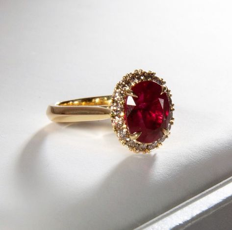 This incredibly special piece showcases one of the most beautiful rubies I’ve ever seen. Crafted in 18k gold, the magnificent precious gemstone is complemented by a fine champagne diamond halo ❤️ #nsbespokedesign Antique Wedding Rings Vintage, Oval Ruby Engagement Ring, Ruby Ring Designs, Antique Ruby Ring, Stone Ring Design, Garnet Wedding Rings, Ruby Ring Vintage, Ruby Wedding Rings, Ruby Ring Gold