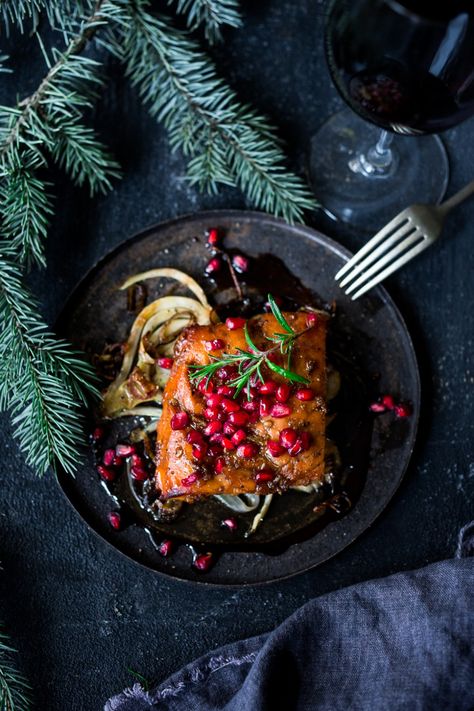 Roasted Pomegranate Salmon with braised fennel - a healthy and festive holiday dinner that can be made in under 30 minutes. | www.feastingathome.com Pomegranate Salmon, Roasted Salmon Recipes, Pomegranate Glaze, Braised Fennel, Fish Monster, Marinated Salmon, Xmas Dinner, Interesting Recipes, Fish Recipes Healthy