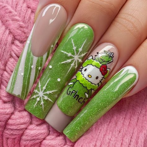 A combination of Hello Kitty and Grinch characters on sparkly green nails makes this design cute and festive. Snowflake accents add a wintry touch, making this a fun and whimsical choice for the holiday season. The Grinch Christmas Nails Acrylic, The Grinch Acrylic Nails, Grinch Nails Designs Short, Grinch Christmas Nail Designs, Hello Kitty Nails Christmas, Pink Grinch Nails, Grinch Nails Short, Grinch Themed Nails, Christmas Nails Coffin Shape