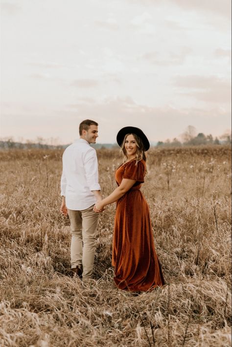 Long Dress Family Pictures, October Engagement Pictures Outfit Plus Size, Engagement Photo Dress Fall, Rust Dress Family Photos, Brown Dress Engagement Photos, Fall Engagement Pictures Outfit Dresses, Couple Fall Photoshoot Outfits, Flowy Fall Dresses, Burgundy Dress Fall