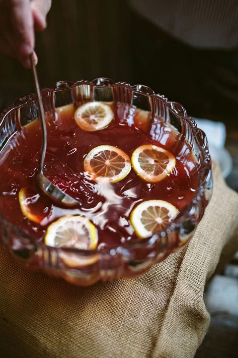 Three Festive Holiday Punches | Cup of Jo Holiday Punch Bowl, Celestial Seasonings, Cup Of Jo, Holiday Punch, Drink Photo, Peach Tea, Festive Drinks, Punch Bowls, Orange Slices