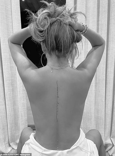 Chrissy Teigen glows as she debuts delicate back tattoo tribute to John Legend's sexy song Ooh Laa | Daily Mail Online Girl Spine Tattoos, Small Back Tattoos, Petite Tattoos, Spine Tattoos For Women, Spine Tattoo, Back Tattoo Women, Discreet Tattoos, Dainty Tattoos, Spine Tattoos