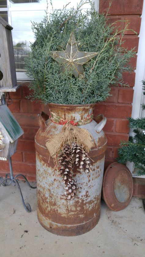 Christmas milk can Milk Cans Ideas, Milk Can Christmas Decor Ideas, Vintage Milk Can, Christmas Mantel Decorations, Milk Cans, Tree Stand, Christmas Mantels, Outdoor Christmas Decorations, Outdoor Christmas