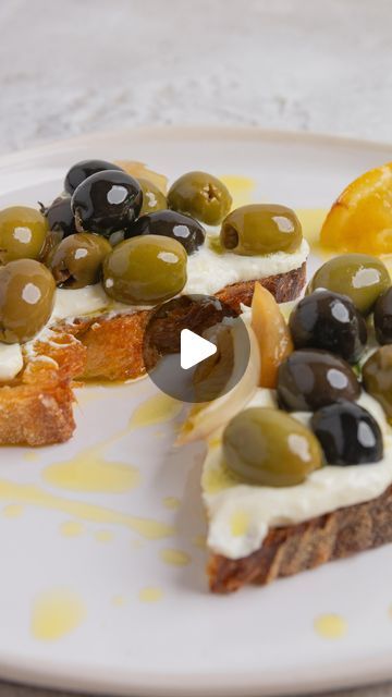 Daen Lia Kelly on Instagram: "Baked olives on toast with whipped feta and ricotta. Full recipe on daenskitchen.Com and linked in my bio . #olives #bakedolives #oliveconfit #confit #garlicconfit #toast #whippedricotta" Baked Olives, Salsa Sauce, Easy Mediterranean Diet Recipes, Whipped Feta, On Toast, Food Tasting, Lemon Slice, Mediterranean Diet Recipes, Shallots