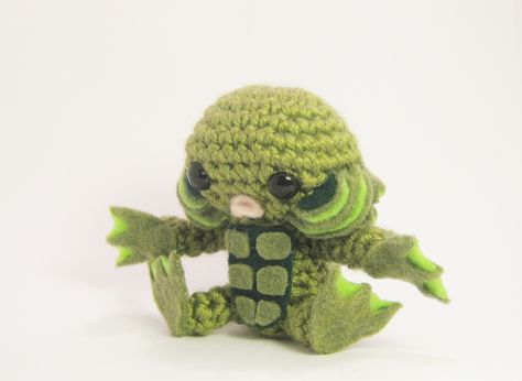 Creature from the Black Lagoon is lonely. Crochet Swamp Monster, Creature Black Lagoon, Crochet Creepy, Crochet Stuffed Toys, Purple Ideas, Tiny Crochet, Creature From The Black Lagoon, Crochet Skull, The Black Lagoon