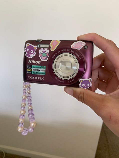 Nikon coolpix s4300 with sanrio stickers Nikon Coolpix Aesthetic, Camera Decorations, Sanrio Stickers, Purple Chrome, Nikon Lens, Digi Cam, Cute Camera, Dream Gift, Nikon Coolpix