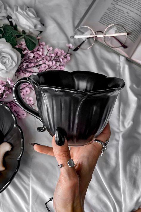 GRIM BLOSSOM.- Statement ceramic mug.- Sculpted floral shape.- Skull base.- Matte finish.- Width with handle 16cm / 6.3".- Height 9cm / 3.5".With KILLSTAR branding,100% Stoneware.Hand was only. Wash before use. Do not Microwave. Imported. Goth Ring Dish, Cauldron Coffee Mug, Raven Pottery Mug, Ghostface Coffee Mug, Clay Moth Mug, Chesire Cat Mug, Addams Family Cup, Kawaii Goth Furniture, Goth Accessories Home