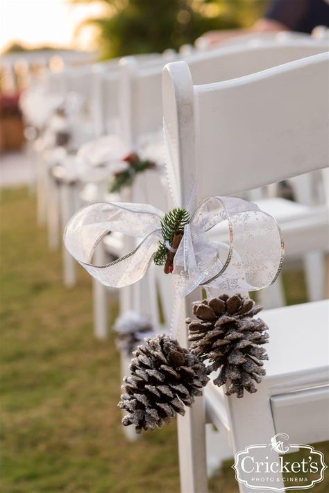 Classy Christmas Wedding Ideas, Christmas Ceremony Wedding, December Wedding Ceremony Decor, Chair Decorations Christmas, Christmas Wedding Chair Decorations, Pinecone Wedding Decor, Christmas Wedding Aisle Decor, Pinecone Centerpiece Wedding, Christmas Wedding Ceremony Decor