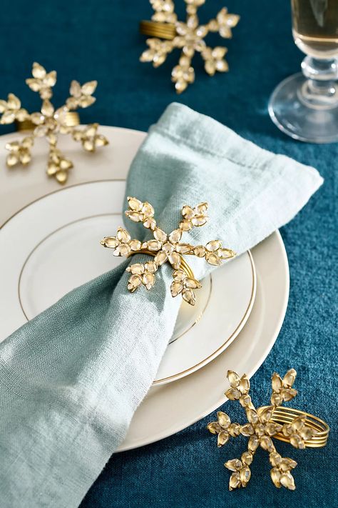 Snowflake Napkin Rings, Set of 4 | Anthropologie Snowflake Napkin Rings, Winter Table, Vanilla Candle, Globe Ornament, Entertaining Essentials, Napkin Folding, Red Candles, Candle Gift Set, Hand Poured Candle