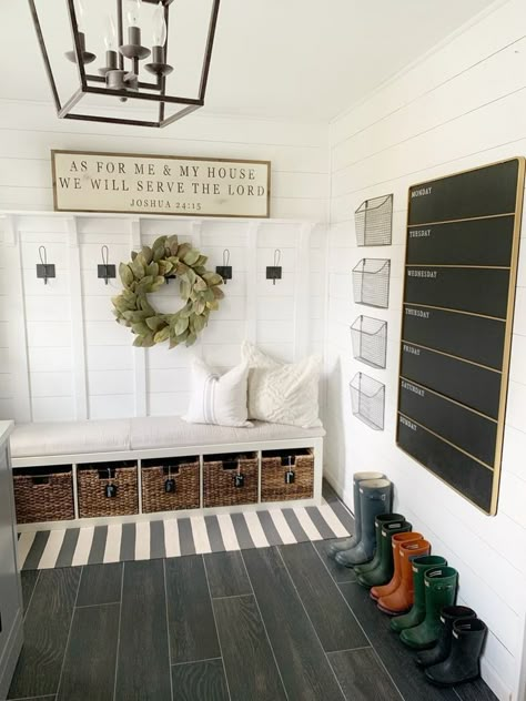 This laundry and mud room has a lovely drop zone, shoe storage, backpack holder, and coat hanging. Plus look at the wire wall mounted baskets for gloves and hats, etc. Keep organized with a giant chalkboard. Laundry Room/mudroom, Mudroom Decor, Mudroom Design, Mud Room, Laundry Room Decor, Farmhouse Wall Decor, Farmhouse Wall, Entryway Decor, Home Renovation