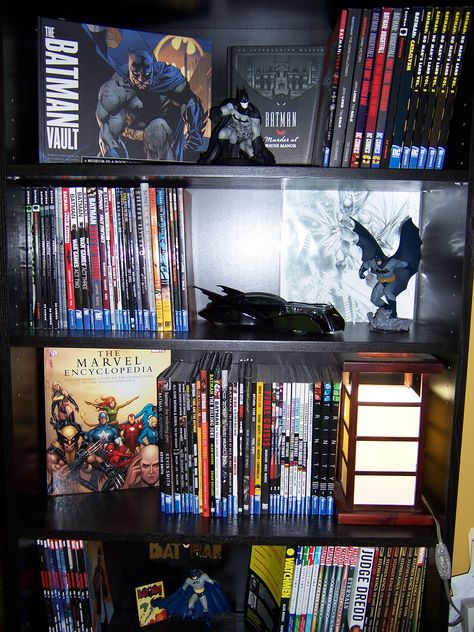 This is my Batman Bookcase...where I keep all of my graphic novels and Batman paraphernalia. Comic Book Display Shelves, Comic Book Shelf Aesthetic, Batman Inspired Room, Comic Book Shelf Ideas, Batman Display Ideas, Graphic Novel Collection, Batman Collection Display, Comic Collection Aesthetic, Comic Book Room Ideas