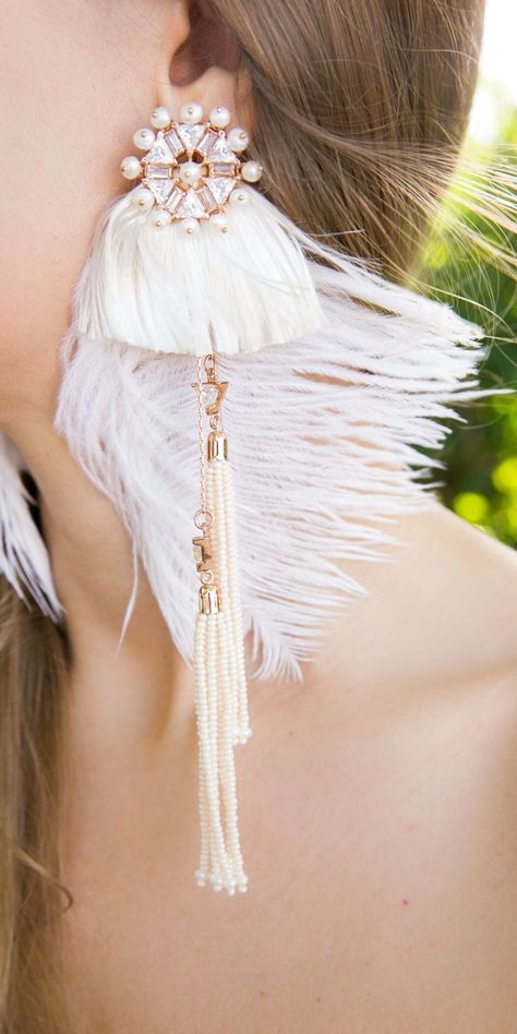 My white bridal statement feather earrings with pearl tassels are by modern Indian jewellery brand Outhouse Jewellery. Perfect Boho wedding earrings inspiration! See full bridal look on GEMOLOGUE! #bridaljewelry #weddingearrings #fashionjewelry #bridalaccessories Full Bridal Look, Outhouse Jewellery, Modern Indian Jewelry, Boho Wedding Accessories, Pearl Tassels, Boho Bridal Jewelry, Boho Wedding Jewelry, Boho Wedding Earrings, Gold Bridal Earrings