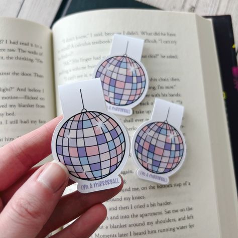 A whimsical mirrorball magnetic bookmark! 💕 Folklore Bookmark, Bookmarks Diy, The Colony, Magnetic Bookmarks, His Hands, Magnets, Ships