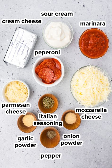 Change up your snack game with Pepperoni Dip! Cream cheese and mozzarella cheese makes it creamy and gooey, and this easy recipe makes it a breeze to prepare. Whether it's game day, a family party, movie night, or just a fun snack night, this pepperoni pizza dip will steal the show! Cream Cheese Pizza Topping, Pepperoni Dip Cream Cheese, Pepperoni Dinner Ideas, Hot Pizza Dip With Cream Cheese, Pizza Cheese Ball, Mdw Food, Pepperoni Cheese Dip, Cream Cheese Pizza Dip, Pizza Dip With Cream Cheese