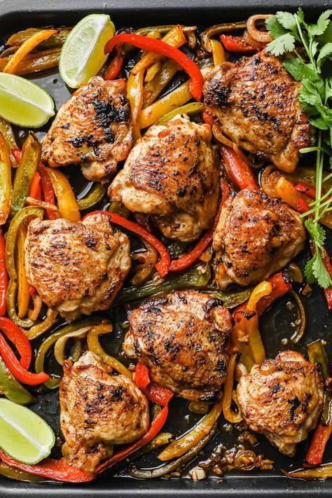 These quick and easy keto Sheet Pan Chicken Fajitas are a delicious spin on traditional fajitas. The perfectly spiced chicken thighs are crispy on the outside, while tender and juicy on the inside. Cooked with a medley of sliced peppers and onions. This dish can be ready and on the table in less than 30 minutes. Keto Sheet Pan, Sheet Pan Fajitas, Pan Fajitas, Sheet Pan Chicken Fajitas, Peace Love And Low Carb, Noom Recipes, Man Recipes, Crispy Chicken Thighs, Spiced Chicken