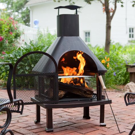 Hold On to Summer: 15 Fire Pits and Chimineas (For Every Budget!) to Keep You Outside Longer — Annual Guide 2016 Fire Pit Chimney, Chiminea Fire Pit, Fireplace Patio, Outdoor Wood Burning Fireplace, Outdoor Wood Fireplace, Fire Pit Materials, Large Fire Pit, Metal Fire Pit, Fire Pit Furniture