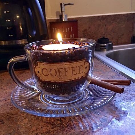 Dollar tree DIY. Coffee scented candle, glue mug & cinnamon sticks to plate. Glue sticker to mug, put a small unscented candle inside (or vanilla scented for vanilla coffee scent). Add fresh coffee beans around the candle and VIOLA! Coffee Crafts Diy, Candles In Coffee Cups, Coffee Scented Candles Diy, Coffee Mug Candles, Diy Coffee Scented Candle, Coffee Bean Candle Holder, Diy Coffee Bean Candle, Candle With Coffee Beans, Coffee Bar Wedding