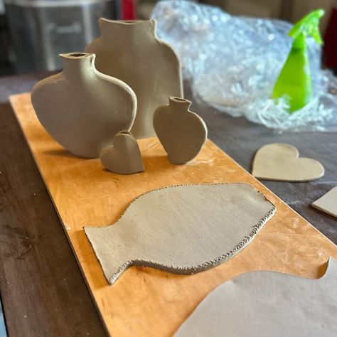 Spent some time this week slabbing more flat vases together. I cannot wait to underglaze these and see what designs happen….. . . . . . . . . . . #throwingmud #craftsposure #kilnfolk #nothingisordinary #studiopottery #makersmovement #wearethemakers #functionalpottery #thehandmademovement #modernmaker #makersgonnamake #shophandmade #handmadeisbest #pottery #insta_pottery #pursuepretty #maker #makesomething #crafty #creatorslane #makersvillage #craft #clayappreciation #clay #flatvase #vase Functional Pottery, Ceramics Pottery, Ceramic Pottery, Handmade Shop, Vase, The Creator, Ceramics, Design